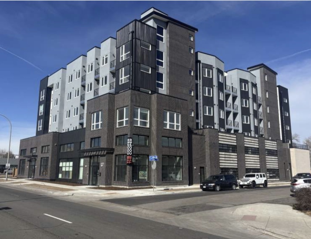 Modern contemporary exterior of The Cooper luxury apartment building in Lakewood, 15 minutes from Downtown Denver